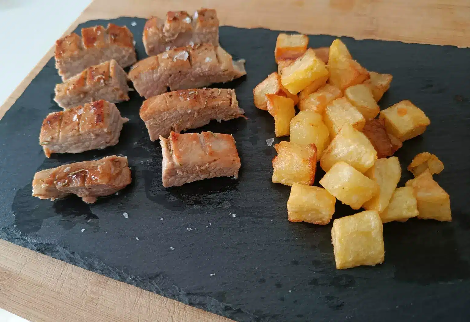 presentacion plato secretos de cerdo al romero